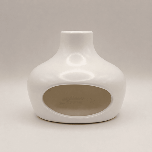 White ceramic vase on a light gray background